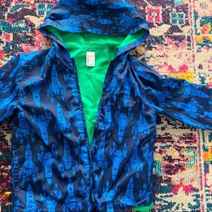 Rain jacket with jets on it.5/6